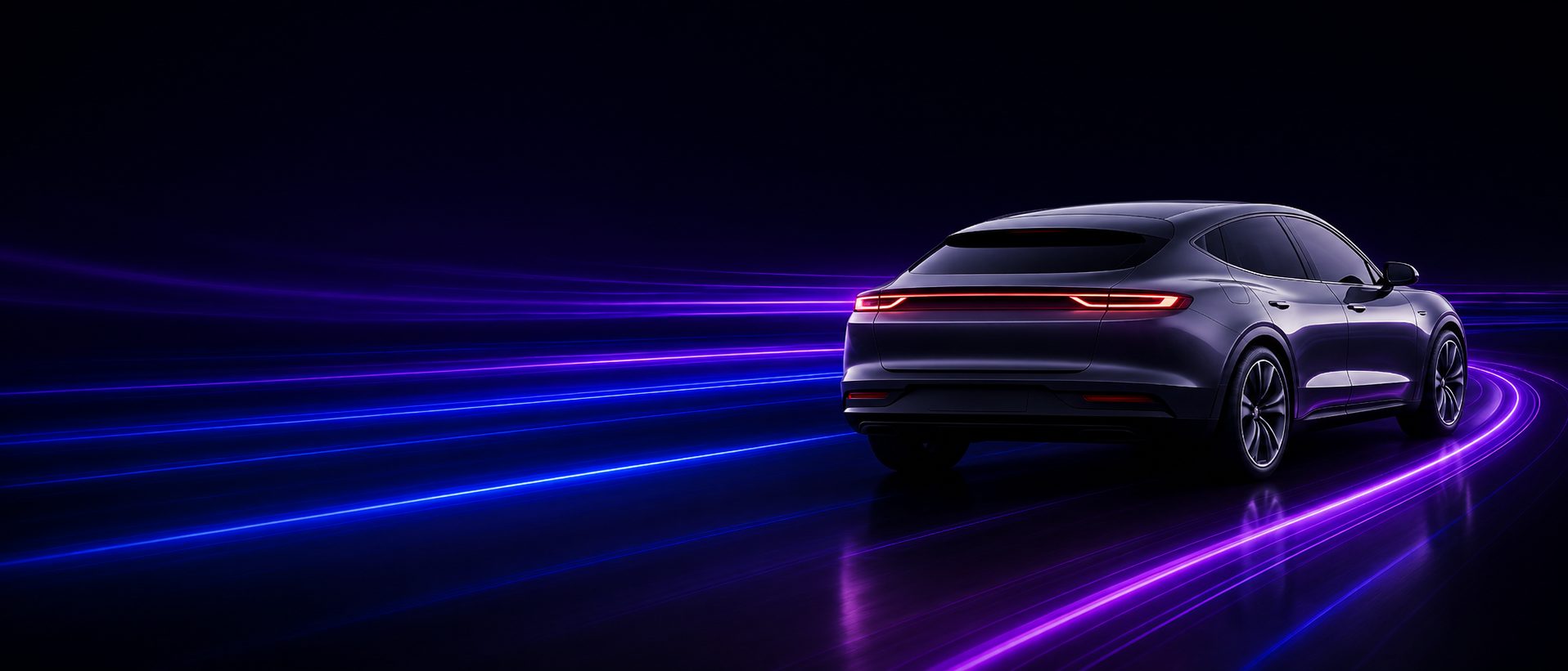 An electric car seen from behind on a dark road with violet and blue light streaks running past it